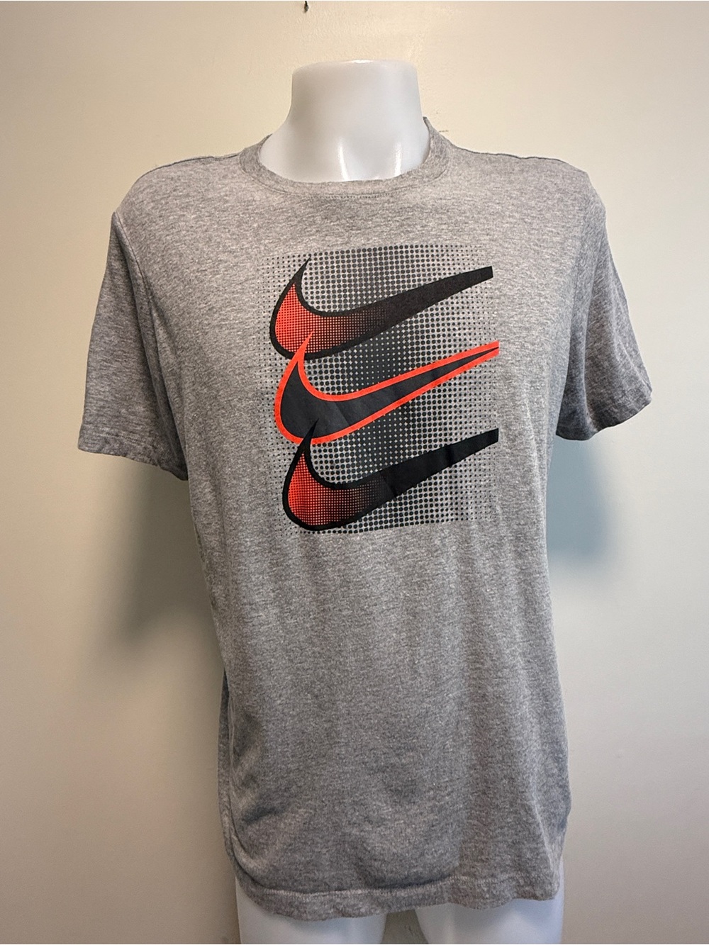 Nike Short-Sleeve Gray Tee with Red and Black Swoosh Graphic